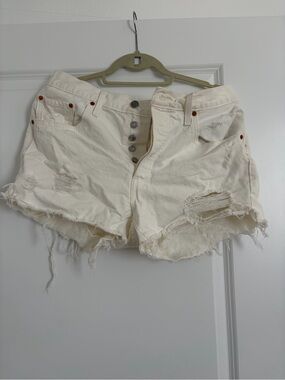 Levi's Cream Distressed Denim Shorts